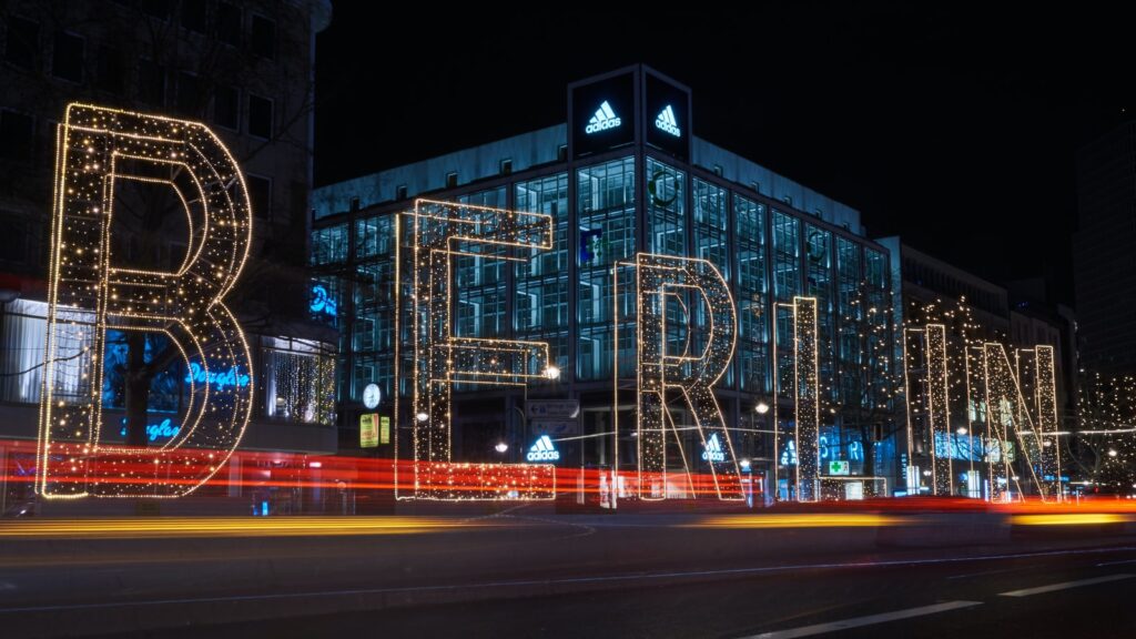Berlin lighted free standing signage during night time